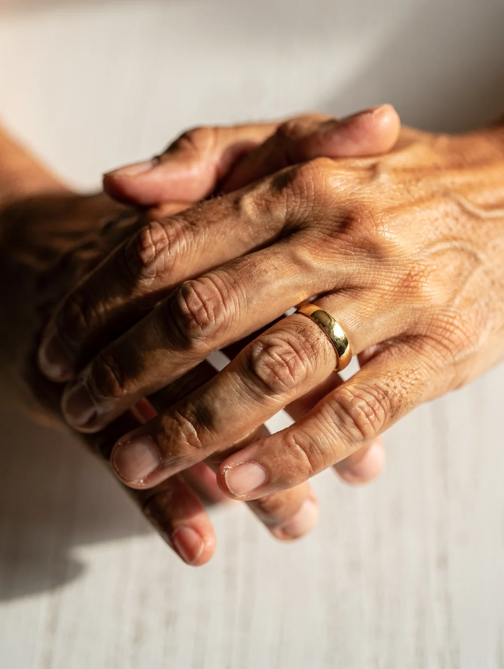 Diverse hands coming together in a gesture of community support